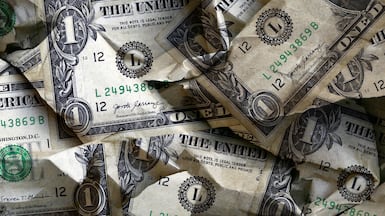 The US dollar this week hit a four-year low against a basket of currencies. Getty Images