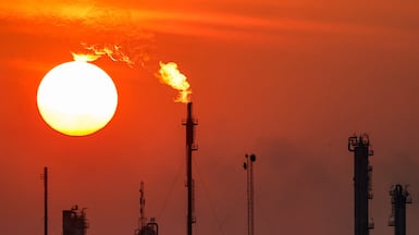 Gas flares at the Dora oil refinery complex in Baghdad. Iraq needs alternatives to Iranian gas imports after Tehran cut its exports. AFP