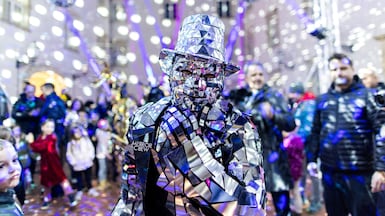 A mirror-clad reveller takes part in the Festival of Lights in Zagreb, Croatia. Reuters