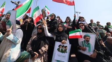 Iranians mourn national security chief Ali Larijani, Basij commander Gholamreza Soleimani and Iranian sailors killed in recent strikes, during their funeral procession in Tehran. AFP